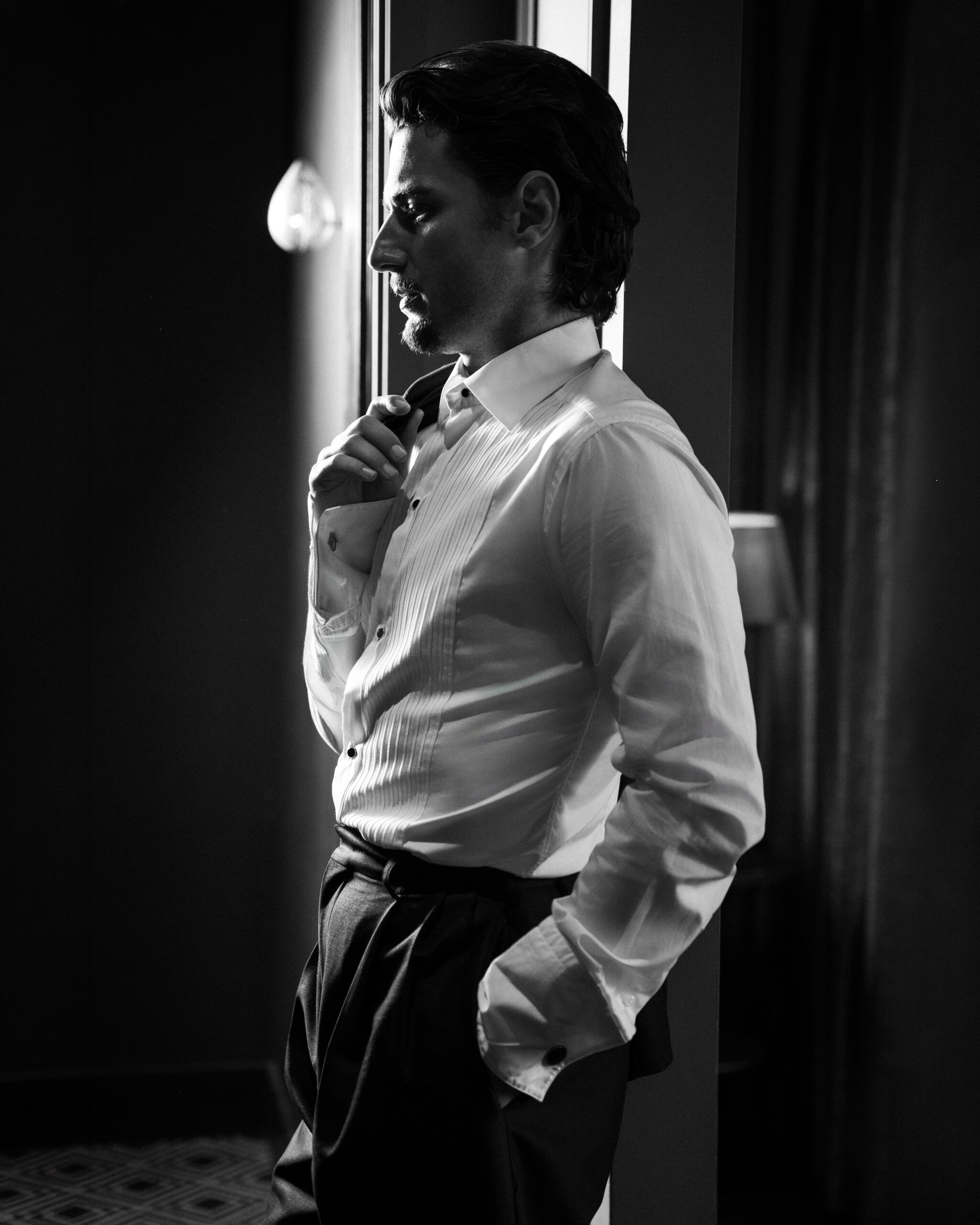 Jack Brett Anderson in an ETON dress shirt at the window of The Mandrake